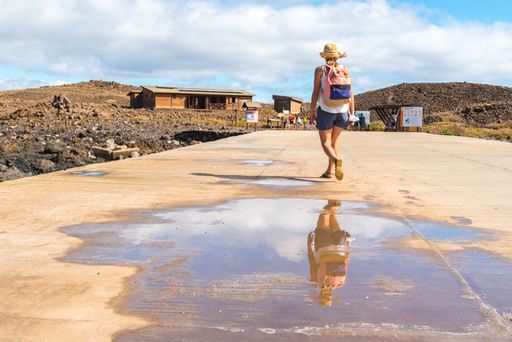 Corralejo, Fuerteventura, Spain: 2020 September 30 : Tourist in the pier of Isla Lobos in Fuerteventura on the Canary Islands in Spain.