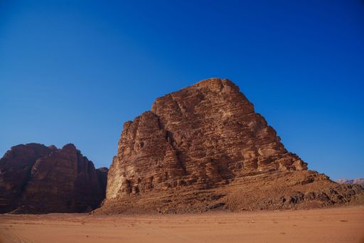 The rock formation in the Wadi Rum desert in Jordan, on a sunny day and blue sky above