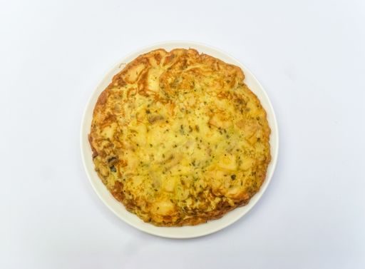 A closeup shot of a Spanish potato omelet on an isolated background