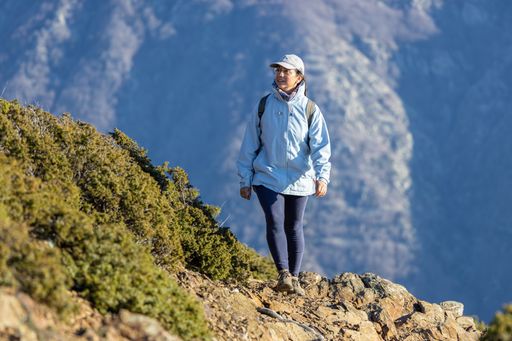 A hiker standing on top of the Mountain Montseny in Spain