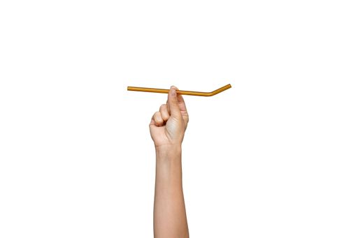Recycling Garbage and separate Trash. Hand holding straw on isolated white background.