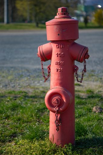 Neuwied, Germany - March 26, 2020: a red hydrant with with signs for German regulations
