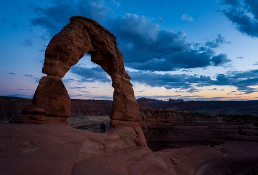 A beautiful view of Delicate arch Moab rocky formation in Utah with evening cloudy sky