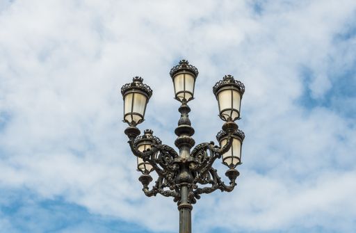 A low angle shot of street lamps in the Plaza de Maria Pita in A Coruna, Galicia, Spain