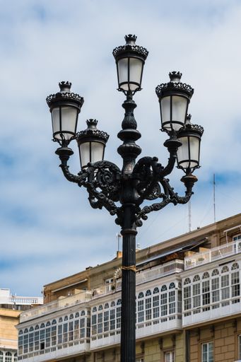 A vertical shot of street lamps in the Plaza de Maria Pita in A Coruna, Galicia, Spain