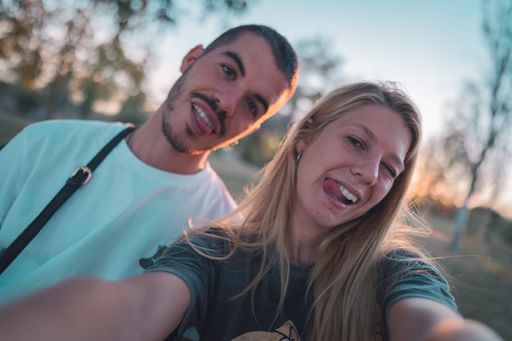 A beautiful young couple in a park