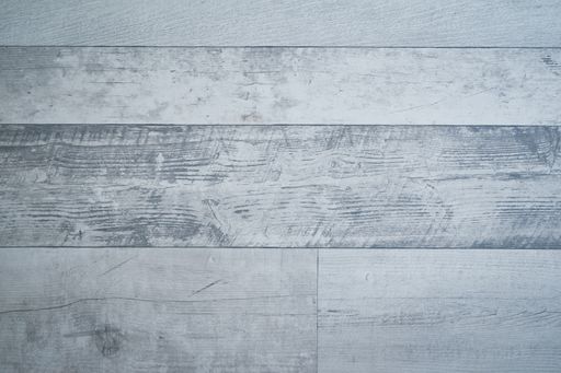 A closeup top shot of a wooden parquet flooring decor