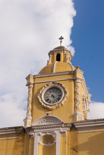 Santa Catalina Arch and ruins in Spanish colonial town UNESCO. World Heritage Site and clouds, Antigua Guatemala.