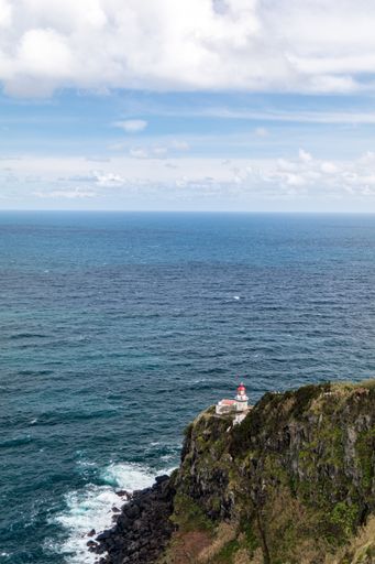 A vertical shot of the Lighthouse Ponta do Arnel in Sao Miguel island