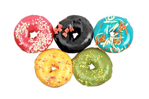 An isolated shot of five different flavored donuts next to each other on white background