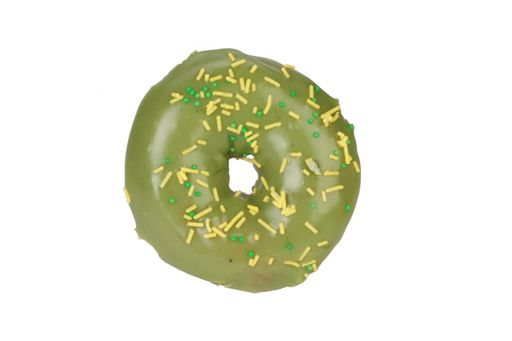 A top view shot of a delicious colorful donut with sprinkles isolated on a white background