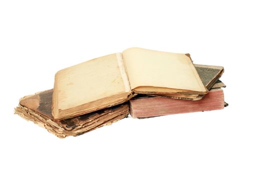 A closeup shot of piled old books isolated on a white background