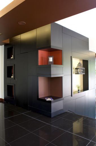 A beautiful corridor furnished with modern wooden furniture