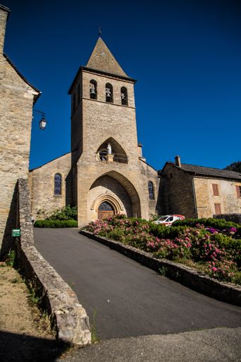 A vertical shot of facade of the Church of Saint-Jean-Baptiste in Chanac, France