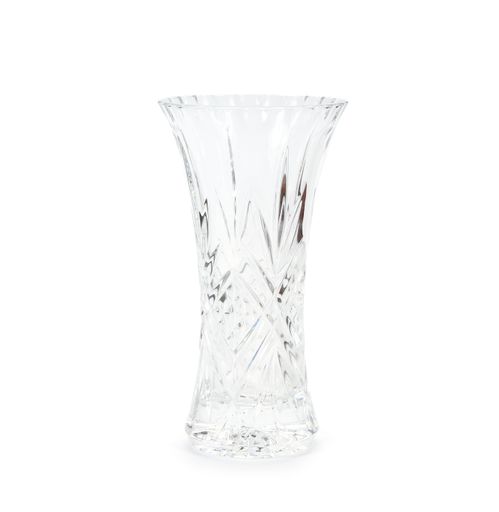 A selective focus shot of a crystal vase on a white background