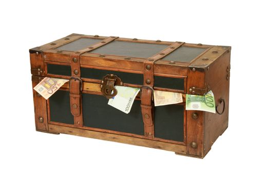 A vintage old trunk with money isolated on a white background