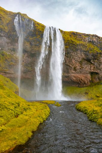 Seljalandsfoss, lays on the river originating at the Eyjafjallajokull glacier. It is located about 60km east of the village of Vik.