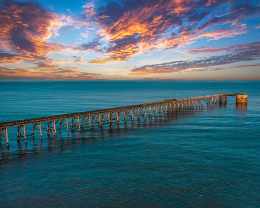Aerial view of Steetley Pier just after sunrise shot from a drone hovering over the North sea