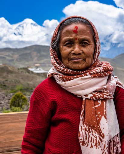 A Hindu Buddhist pilgrim worshiper at Muktinath Temple in Upper Mustang Nepal Himalayas