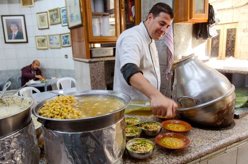 Amman, Jordan. December 12th 2012 Hashem Restaurant, downtown Amman, Jordan.Fuul, Falafel and Hummus being prepared at the legendary eatery. 