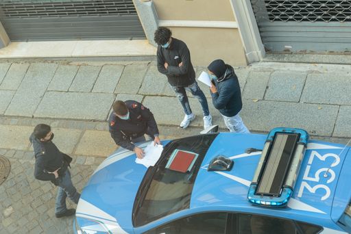 Two young man are stopped by police and sign fine for lockdown violation as second wave of covid-19 lockdown started yesterday