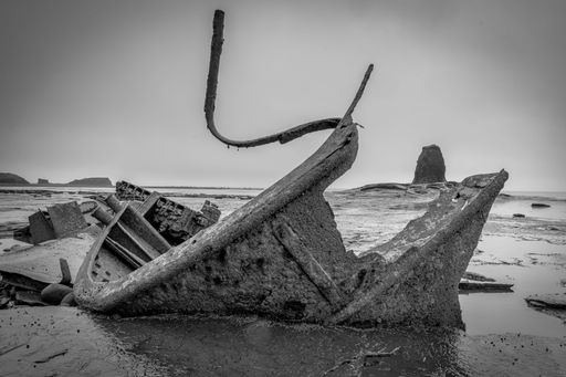 A shipwreck at Saltwick bay, UK in grayscale - closeup shot