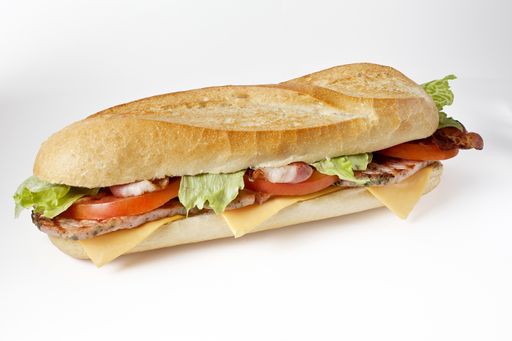 An isolated shot of pork and vegetable sandwich on a white background