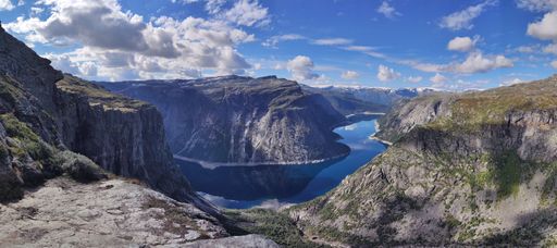 A scenic view of Ringedalsvatnet with glimpses of the Folgefonna glacier in the background