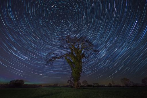 A breathtaking scenery of a unique meteor shower in the magical night sky