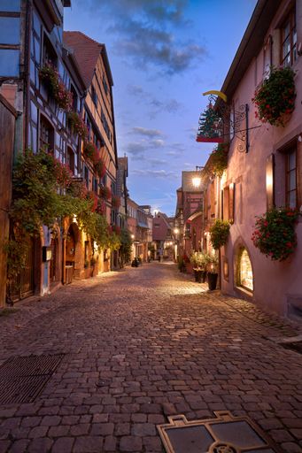 A vertical shot of Sunset in the streets of Riquewihr, Alsace, France
