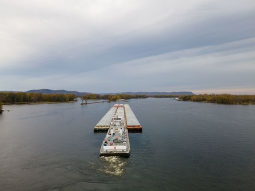 Bird's Eye View of a Small Container Ship Barge on Mississippi. in La Crosse Wisconsin