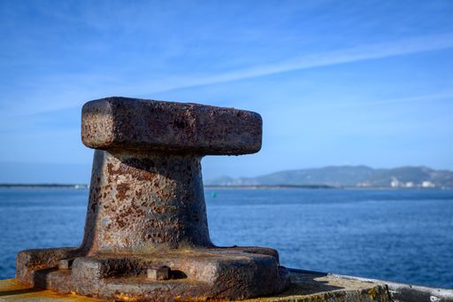 A view of rusty dock bollard in the pier