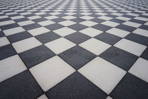 A checkered floor in black and white colors
