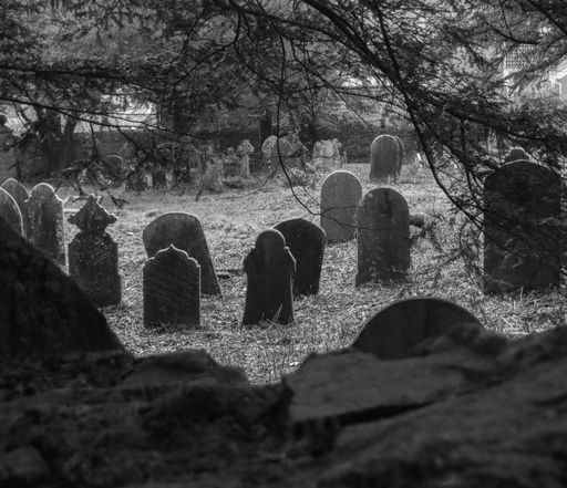 The black and white graves in an Abandoned cemetery in Mountain Ash, South Wales