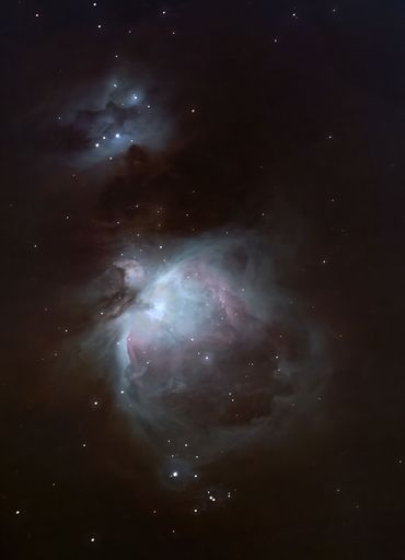 A vertical shot of the mesmerizing Orion Nebula - perfect for wallpaper