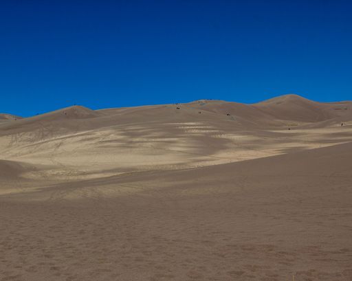 An aerial view of the beautiful brown Sand Dunes National Park in Colorado