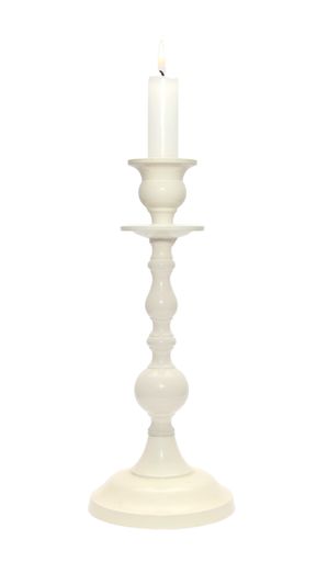 A vertical shot of white candlestick isolated on white background