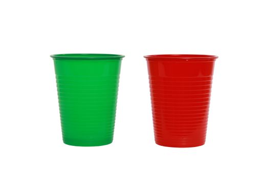 Two green and red plastic cups isolated on a white background
