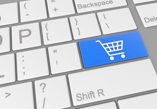 A special button with a shopping cart on a laptop keyboard