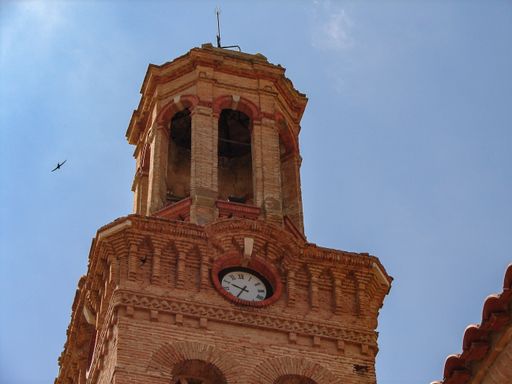 A low angle shot of the Tower of the Church of the Jesuits in Spain