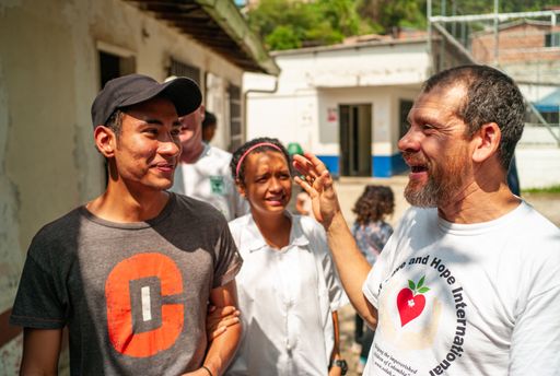 Itagui, Antioquia / Colombia - March 15 2019: Volunteer Group of Seeds of Love and Hope International Center Visiting the Neighborhood