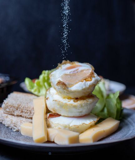 A process of adding salt to the egg breakfast