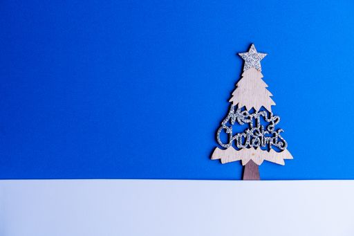 A closeup shot of a Christmas cardboard with decorations