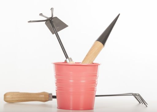 A shot of gardening tools on a white background