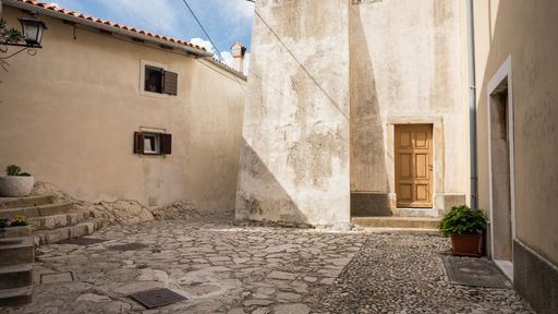 A fantastic shot of some old buildings made of brown stone in Croatia