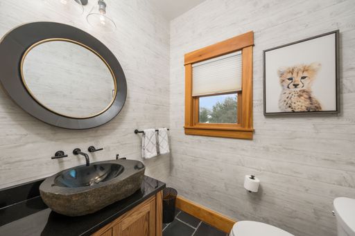 An interior of a modern bathroom with a beautiful design