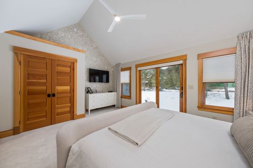 The beautiful modern bedroom interior design. Custom-built house in the mountains.
