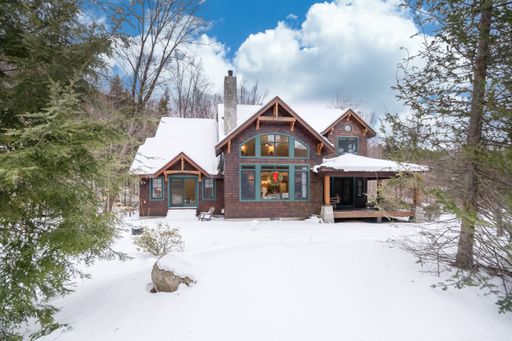 A custom-built house in the mountains. Exterior facade.