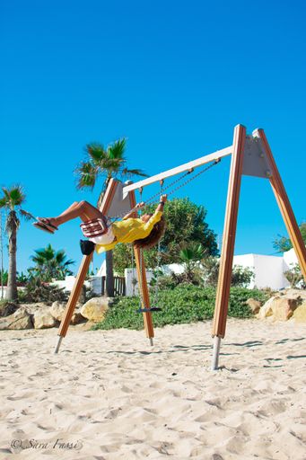 A shot of a woman having fun on a beach