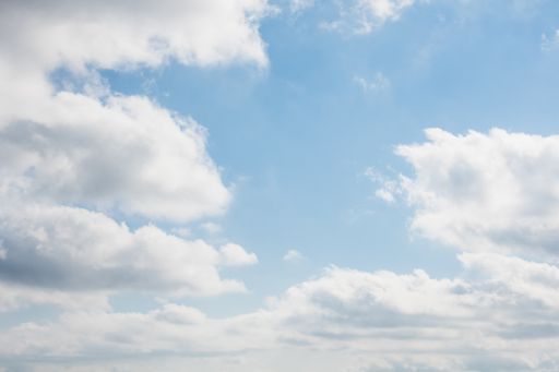 A low angle shot of the clouds in the sky during daytime